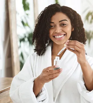 femme avec huiles essentielles à Montauban dans le Lot-et-Garonne 82